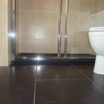 Low Level Black Shower Tray with Black Natural Stone Floor